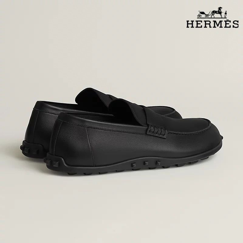 Hermès Trip Series Leather Penny Loafers "Black"